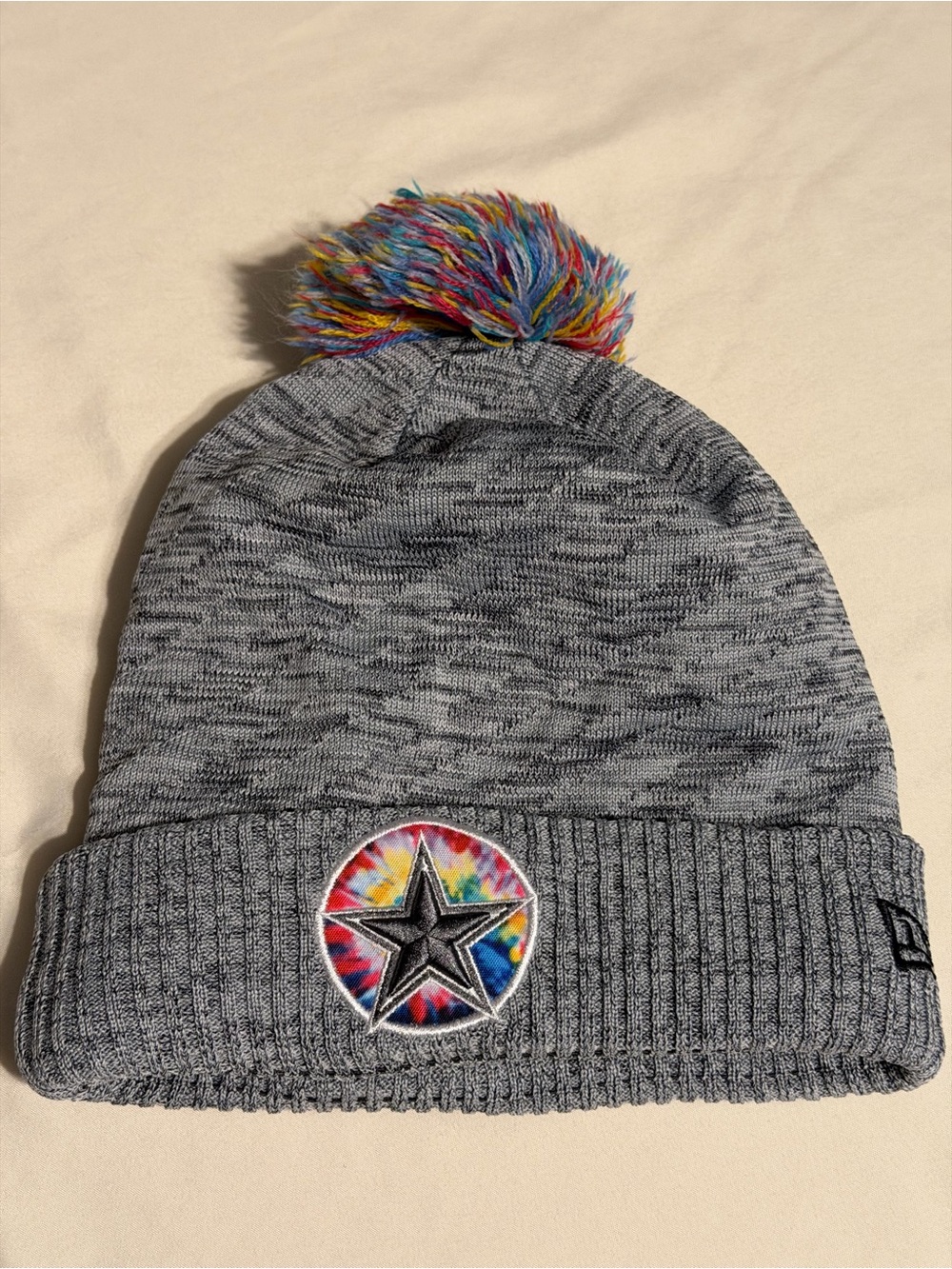 New Era Kids Gray Knit Beanie with Multicolor Pom-Pom and Tie-Dye Star